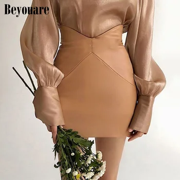 Beyouare Elegantiška Vintage Aukšto Juosmens Kietas PU Oda Moterų Sijonas Atsitiktinis Slim Asimetrinė Juosmens Mini Sijonas 