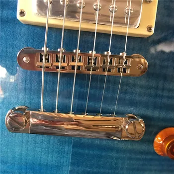 Aukštos kokybės elektrinė gitara, kietas raudonmedžio korpusas su mėlyna liepsna maple top, chromuotas aparatūros, nemokamas pristatymas